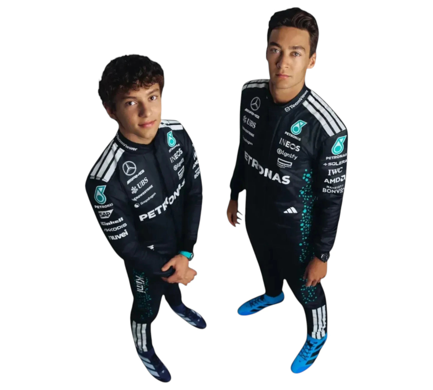 Two children wearing Formula 1-themed racing suits with visible branding on a white background.