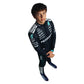 Child wearing a black racing suit with sponsor logos on a white background